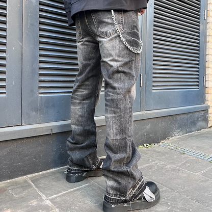 WASHED FLARED RAW-EDGE JEANS